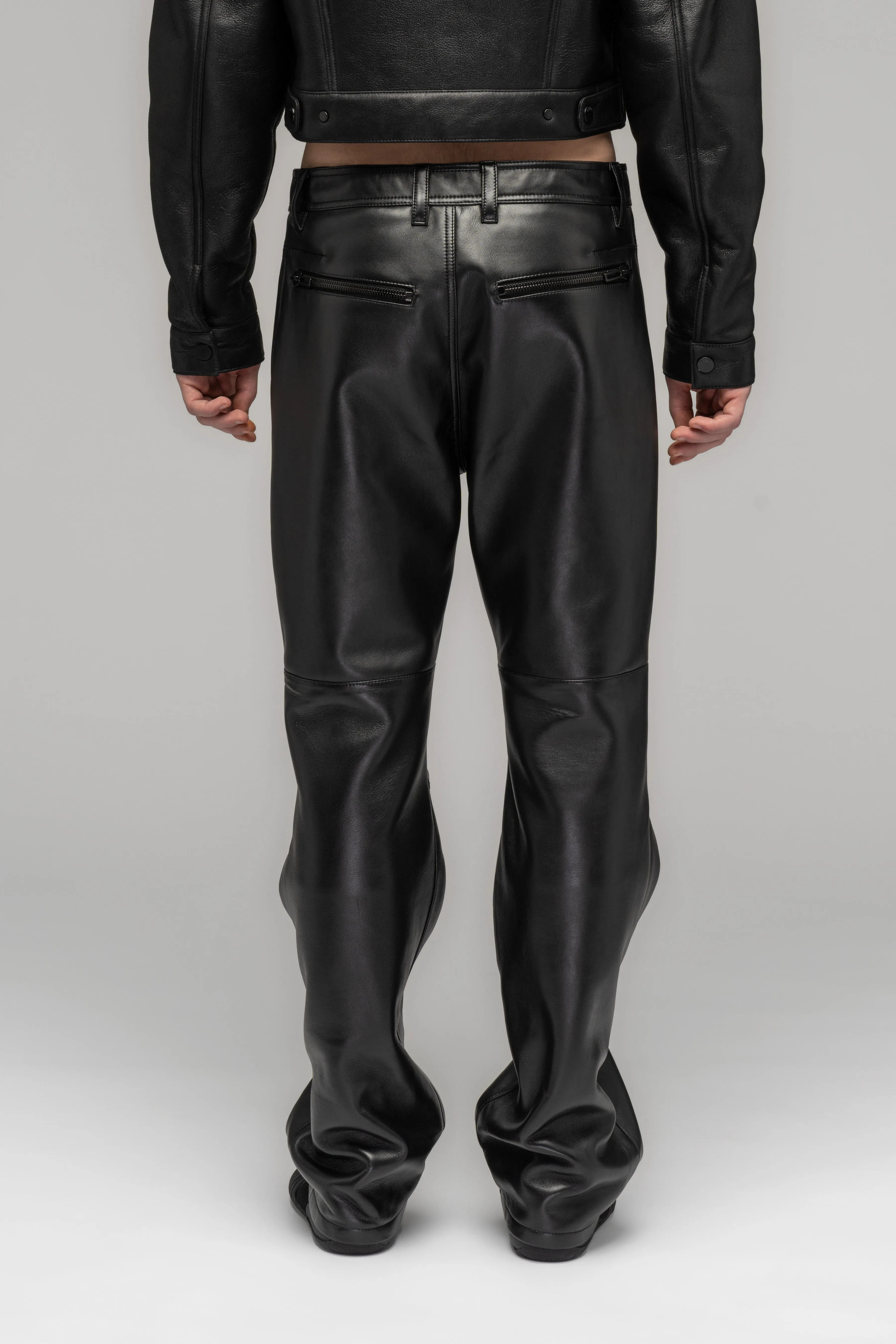 "SINGULAR" LEATHER ZIP TROUSERS